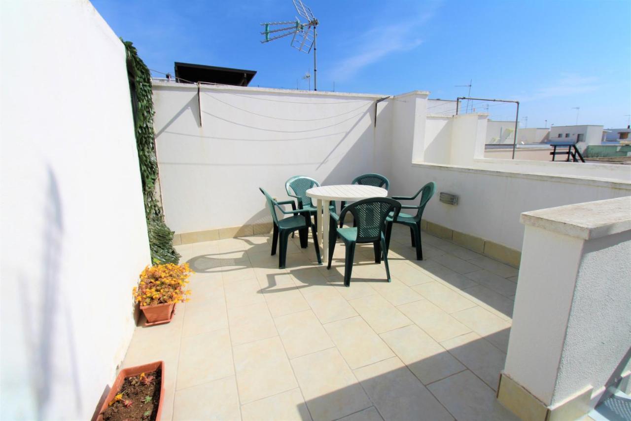 Appartement Trilocale Arancione Climatizzato Con Terrazza Panoramica à Torre San Giovanni Extérieur photo